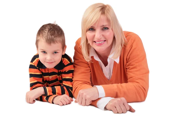 Middleaged woman with boy lying — Stock Photo, Image