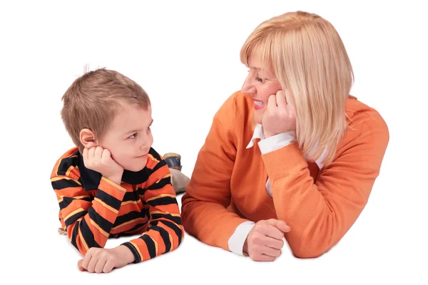 Middleaged woman with boy lying 2 — Stock Photo, Image