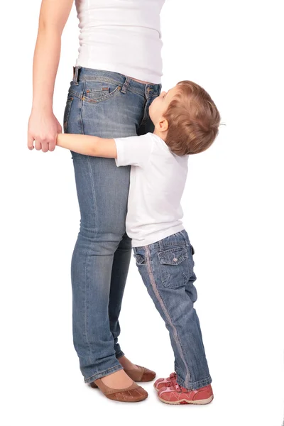 Girl embrace mother legs — Stock Photo, Image