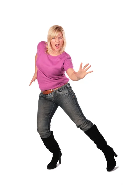 Middleaged woman in pink shirt stands dancing 4 — Stock Photo, Image