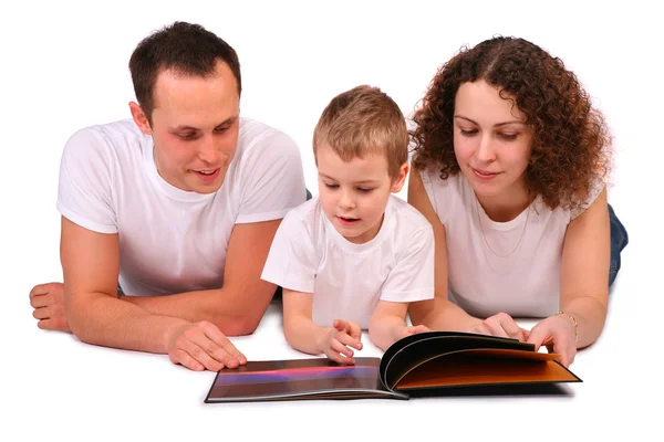 Family reads magazine — Stock Photo, Image