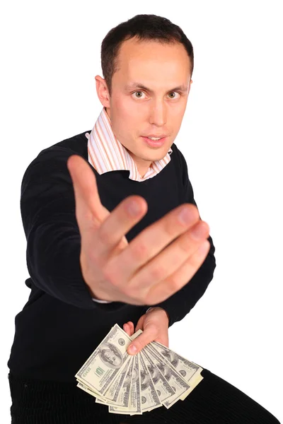 Молодой человек в черном с деньгами приглашает — стоковое фото
