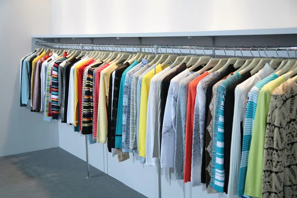 Clothes on racks — Stock Photo, Image