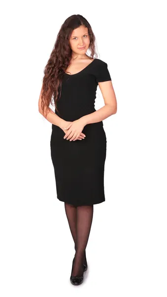 Молодая симпатичная девушка в черном платье — стоковое фото