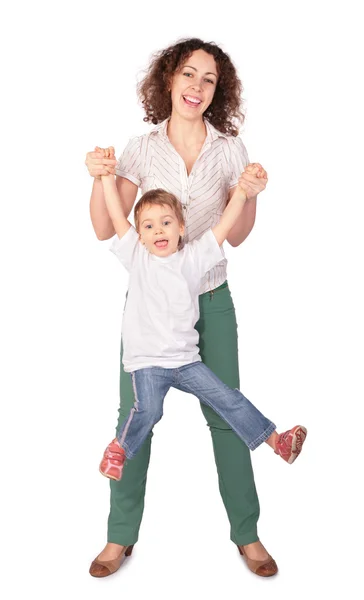 Mamma håller barnet för händer — Stockfoto