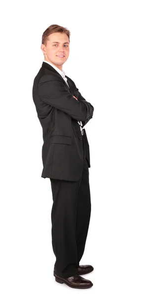 Young man in suit posing cross hands — Stock Photo, Image