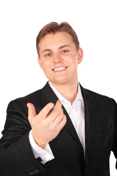Jonge man in pak gebaar hand naar voren — Stockfoto