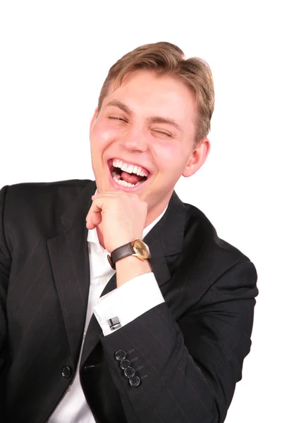Jeune homme en costume rire — Photo