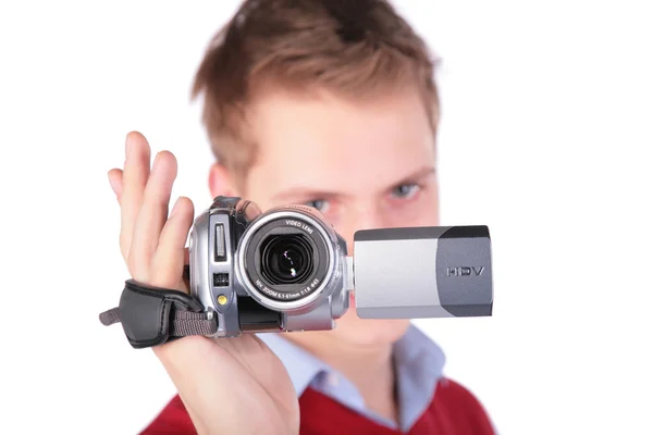 Garçon en veste rouge avec caméra HDV — Photo