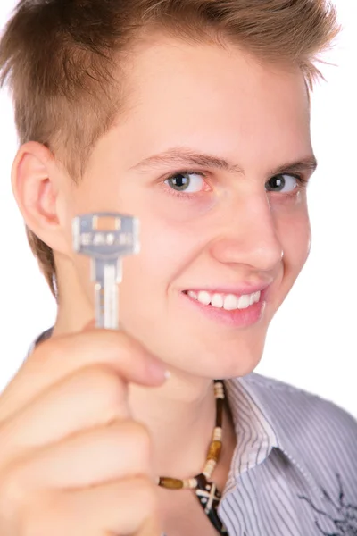 Rapaz mostrando chave — Fotografia de Stock