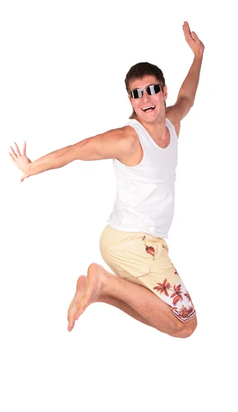 Young man in sunglasses jumps — Stock Photo, Image