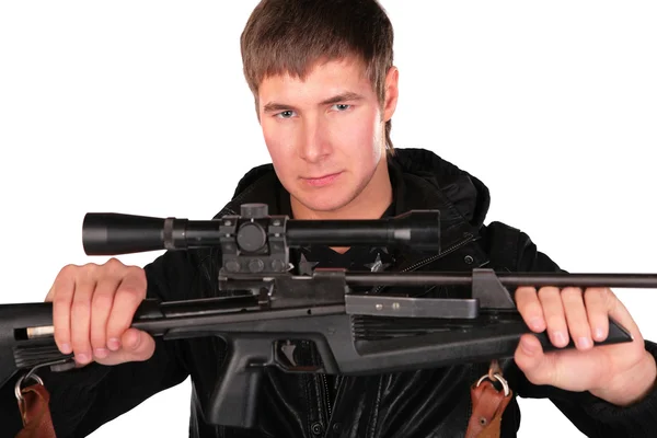Mladý muž drží zbraň — Stock fotografie
