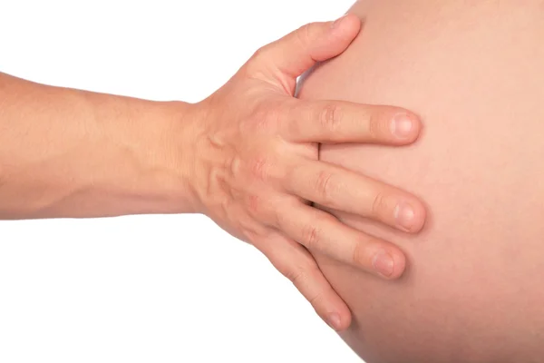 Hand berührt Schwangerschaftsbauch — Stockfoto