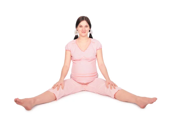 Pregnant girl trainning on frloor — Stock Photo, Image
