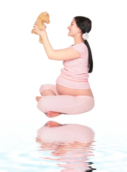 怀孕的女孩与玩具 — 图库照片