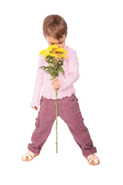 Malá dívka s květinou — Stock fotografie