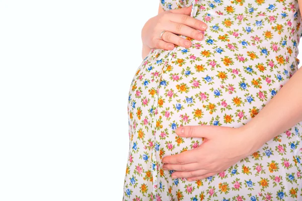 Живот беременной девушки — стоковое фото