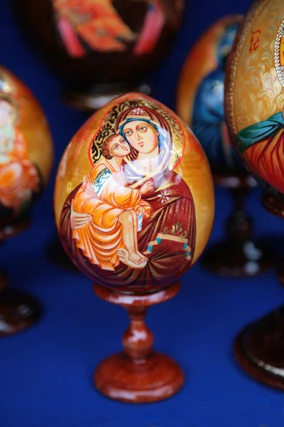 Wooden easter egg with painted our lady — Stock Photo, Image