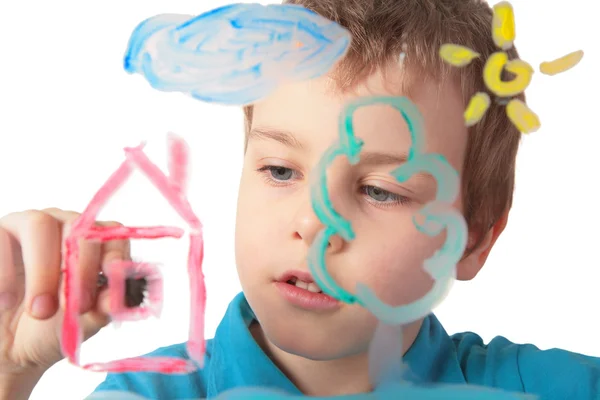 Child paints on glass — Stock Photo, Image