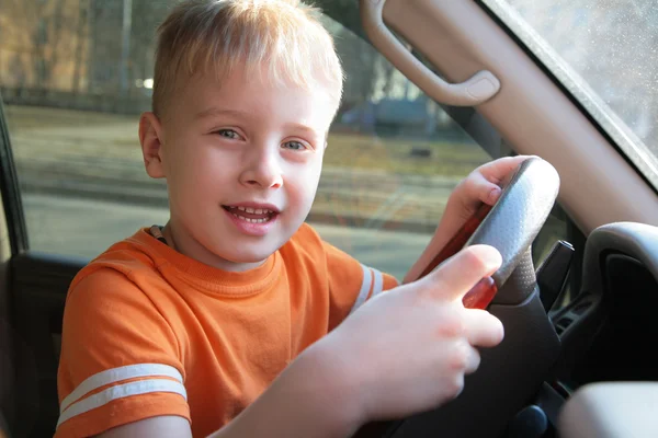 Boy in car — Stok fotoğraf