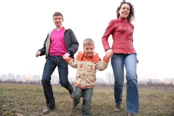 Family run outdoor in city on spring — Stock Photo, Image