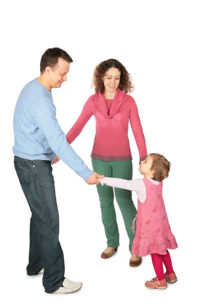 Parents stand having joined hands with daughter — Stock Photo, Image