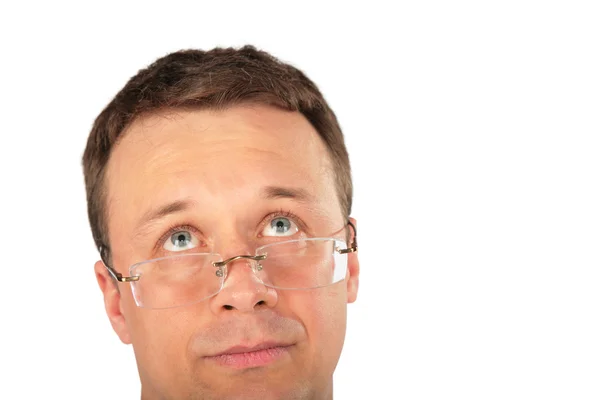 Голова задумчивого человека в очках — стоковое фото
