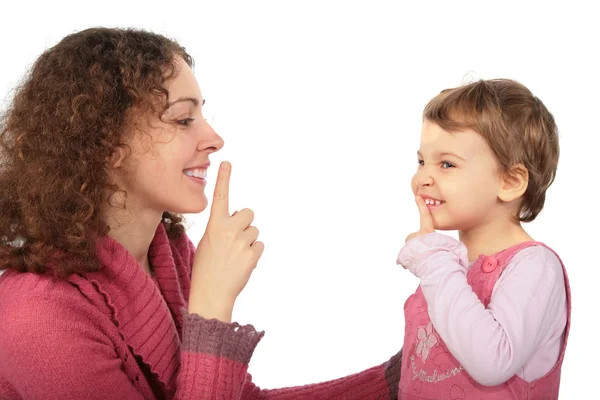 Мать и дочь делают жест более тихо — стоковое фото
