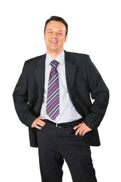 Uomo d'affari sorridente posa — Foto Stock