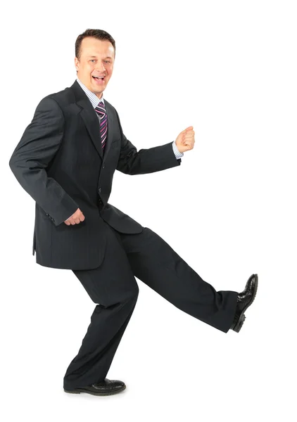 Dynamic businessman in black suit — Stock Photo, Image