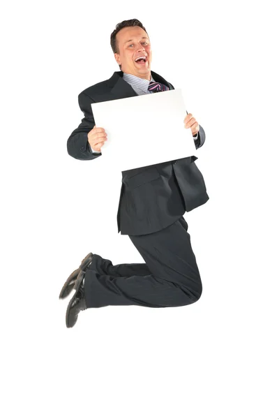 Homme d'affaires sautant avec du papier blanc — Photo