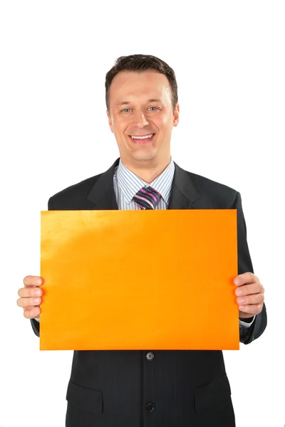 Επιχειρηματίας με πορτοκαλί φύλλα χαρτιού — Φωτογραφία Αρχείου