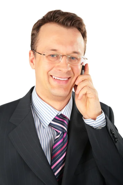 Podnikatel v brýlích mluví na mobilní telefon — Stock fotografie