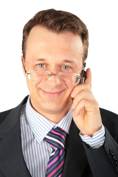 Homem de negócios em óculos fala no telefone celular — Fotografia de Stock
