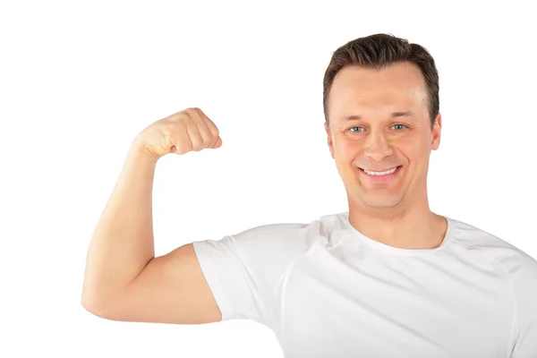 Muž ukáže biceps — Stock fotografie