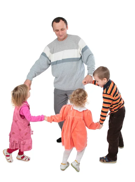 Man met drie kinderen dansen — Stockfoto