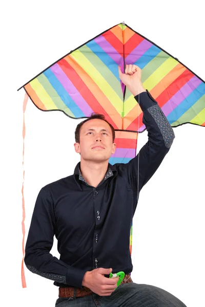 Man holds kite above head — Stock Photo, Image