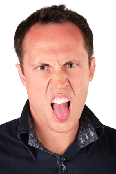 Hombre enojado muestra lengua — Foto de Stock