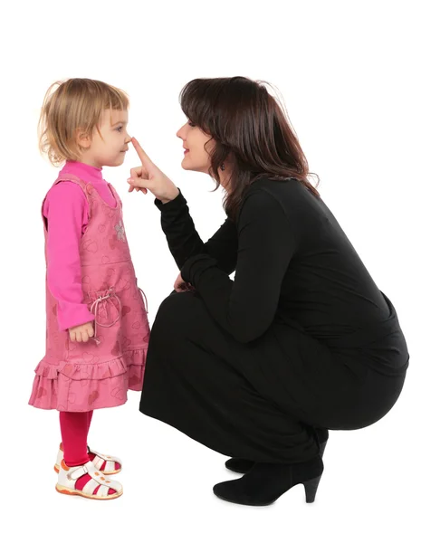 Mother touchs daughter's nose — Stock Photo, Image