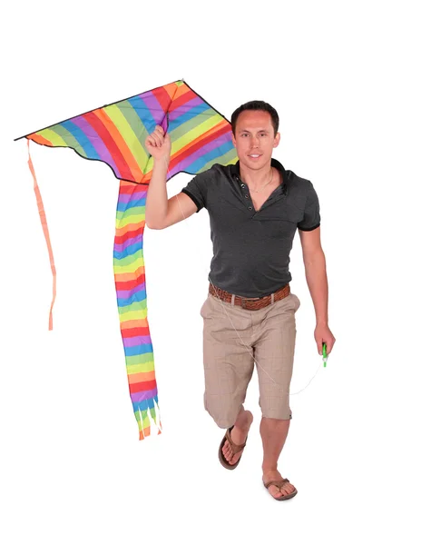 Man carrys kite — Stockfoto