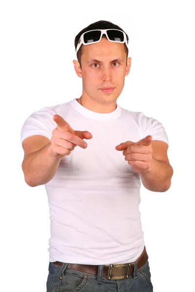 Mężczyzna wskazuje przez palce — Zdjęcie stockowe