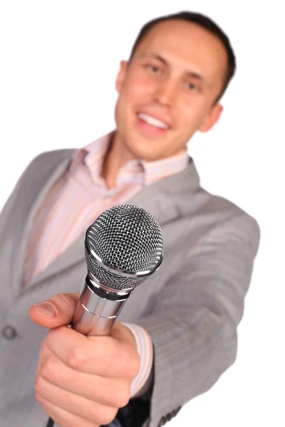 Homem segura microfone na mão — Fotografia de Stock