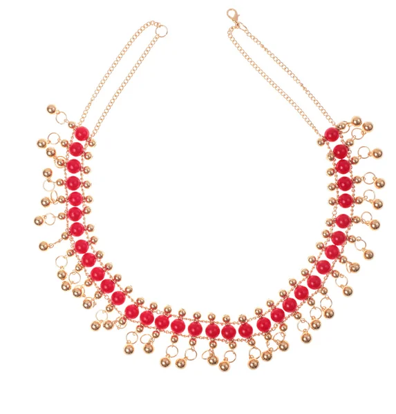 Goldene Halskette mit roten Edelsteinen — Stockfoto