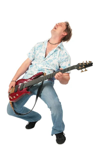 Young man with guitar dancing — Stock Photo, Image