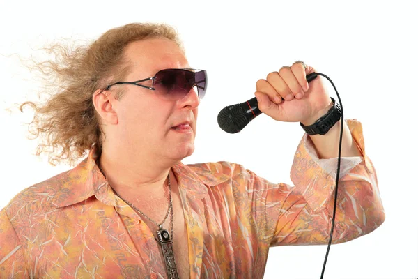 Zralý muž s mikrofonem — Stock fotografie