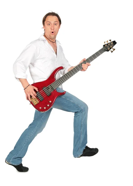 Man with guitar in move — Stock Photo, Image