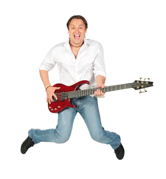 Man with guitar jumps — Stock Photo, Image