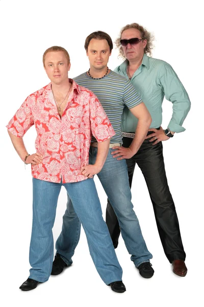Три стоящих человека — стоковое фото