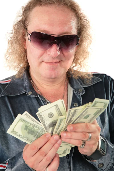 Hombre en gafas de sol con dólares —  Fotos de Stock