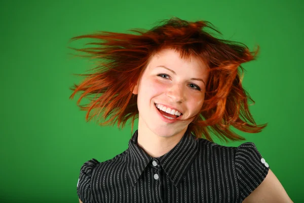Portrait of girl with red flying hair — Stock Photo, Image